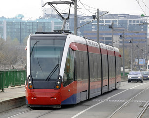 Fototapeta na wymiar Modern looking multi carriage tramway