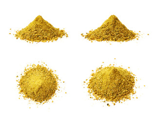 Pile of yellow curry seasoning isolated