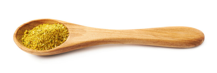 Wooden spoon of curry isolated