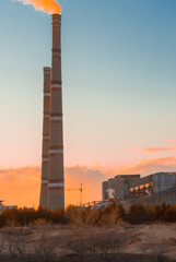 Fototapeta na wymiar Industry electricity plant during sunset