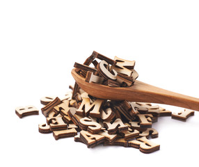 Pile of wooden letters isolated