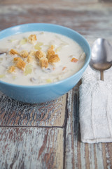 Creamy Mushroom Soup on a wooden background