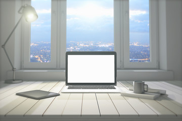 Fototapeta premium Blank laptop at night