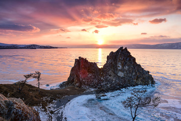 Stunning sunset above the frozen surface of the lake Baikal on the Olkhon iceland