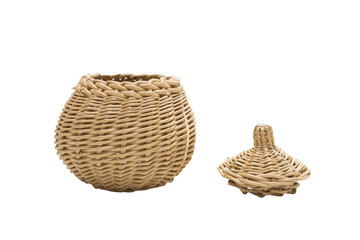 Wicker round vessel with a lid on isolated background