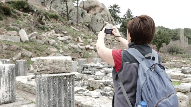 Tourist Photographing Ruins of Ancient Temple. 4k