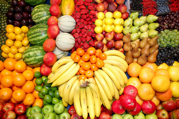 Set of freshly picked organic fruits at market stall
