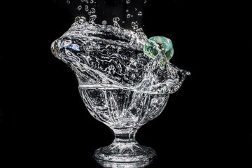 Playing with water and rubber ball