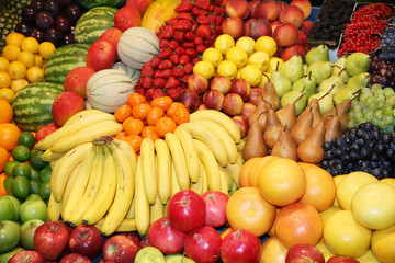 Naklejka na ściany i meble Set of freshly picked organic fruits at market stall