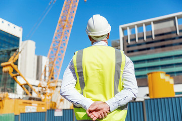 Engineer builder at construction site