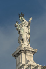 Fototapeta na wymiar Statue of Saint Maria at Basilica Santa Maria Salute Venice