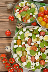 Vegetarian salad with cherry tomatoes, eggs and cheese