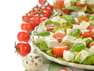 Vegetarian salad with cherry tomatoes, eggs and cheese