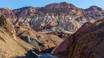 Artist drive turns into a narrow and winding road. Dry and hot, the drive is Located in Death Valley. Artist's Drive, Death Valley National Park
