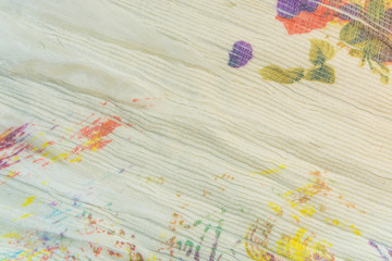 The Tighting white silk fabric with multi-colored prints