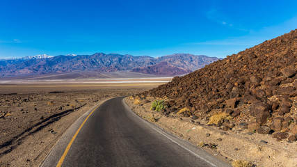 Road through canyons with lots of different topography. The one-way road is great and offers majestic views. It contains colorful rock formation. Artist's Drive, Death Valley National Park