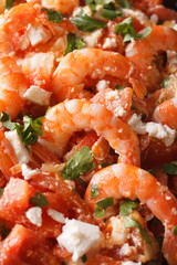 Greek saganaki prawns macro. vertical 
