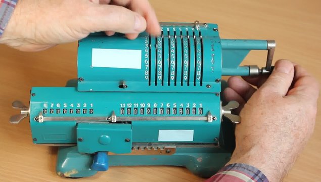 Adding machine.
Adding machine - mechanical computing means.