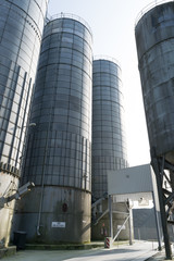 Old steel silos with white cement