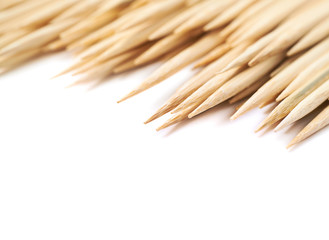 Pile of wooden skewers isolated