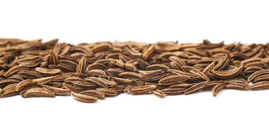 Line of cumin seeds isolated