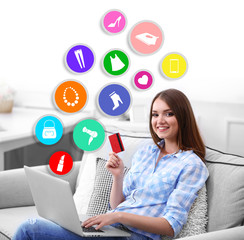 Online shopping.Young beautiful woman with laptop and credit card at home