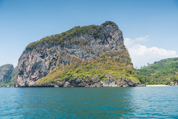 Fototapeta premium Mountain island on the sea blue sky