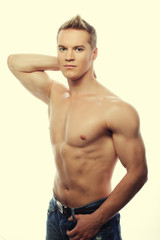 Fototapeta na wymiar Healthy muscular young man. 