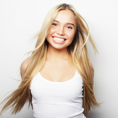 Fototapeta premium Young cute smiling blond girl
