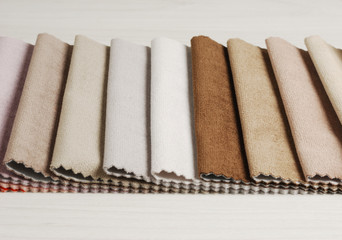 Bright collection of colorful velour textile samples. Fabric texture background