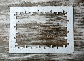 Puzzles on wooden table