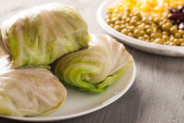 Stuffed cabbage rolls on a wooden table
