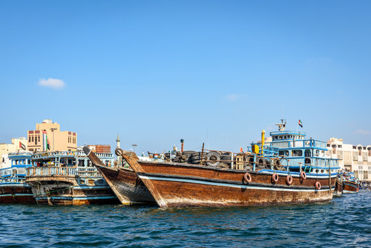 Traditional arabian boats or dhows docked at Dubai Creek