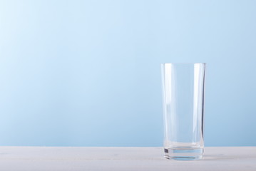 empty glass on a blue background