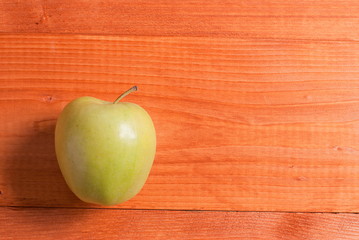 green apple on the table