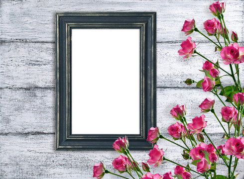 Pink roses and photo frame