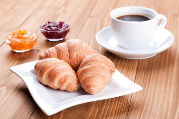 Croissants in a plate on the table