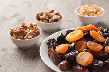Dried fruits in a white plate with nuts