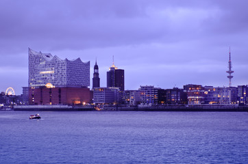 Obraz premium Hamburg's harbour city with St Michaelis Church and Elbe Philharmonic Hall