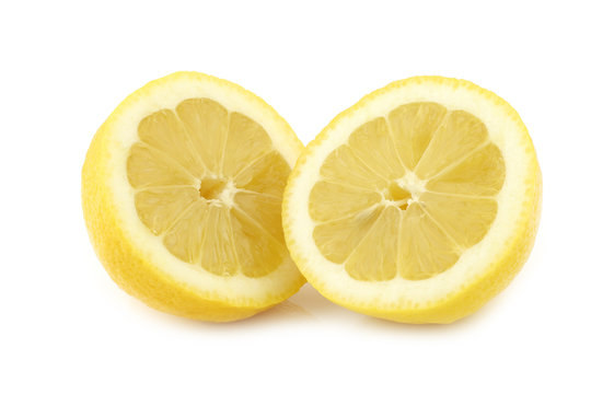 fresh lemon halves on a white background