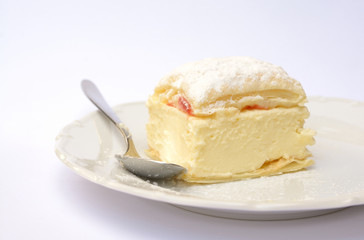 Sweet dessert of puff pastry and vanilla pudding