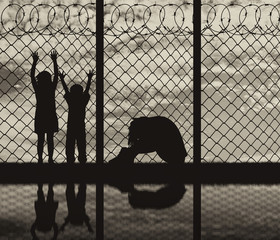Silhouette refugee mothers and children
