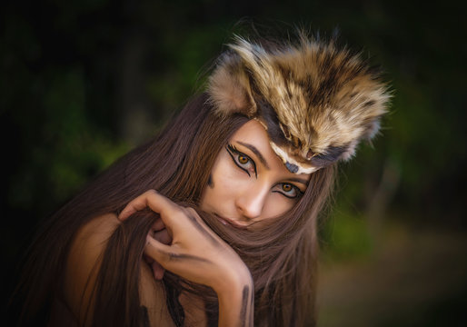 Portrait of a beautiful brown-eyed Amazon in furs