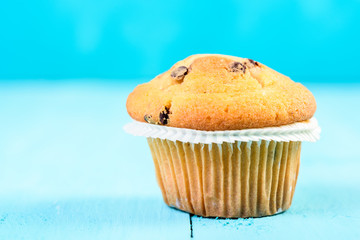 Homemade Chocolate Chip Muffin On Blue Table