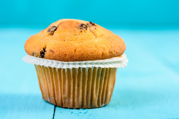 Homemade Chocolate Chip Muffin On Blue Table