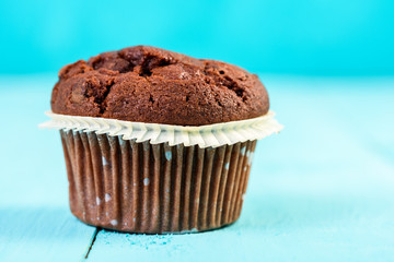 Homemade Chocolate Chip Muffin On Blue Table