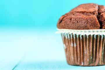 Homemade Chocolate Chip Muffin On Blue Table