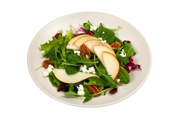 Pear Salad with Goat Cheese. Isolated on white. Selective focus.