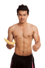 Fototapeta premium Muscular Asian man with banana