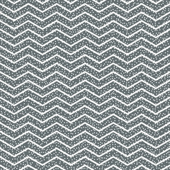 Geometric abstract chevron zigzag stripes pattern. Vintage hipster striped. Wrapping paper. Scrapbook paper. Vector illustration. Background. Graphic texture with randomly disposed spots.